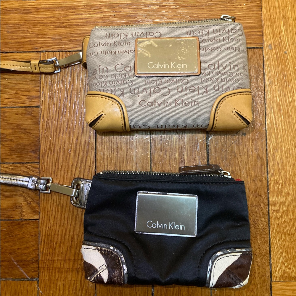Calvin Klein Logo Wristlet Duo in Brown and Black. Still with clear lining.